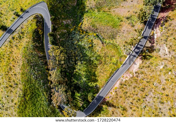Roads from aerial on the beautiful island\
of Gran Canaria in a peaceful natural\
setting