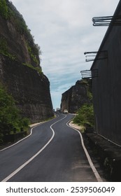 Roads with cliffs on the left and right, located near from Pandawa Beach Bali