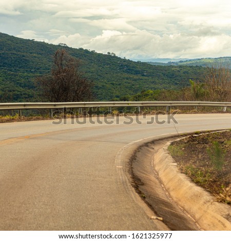 roads through the countryside curves asphalt truck natural landscapes and beauties in the streets, avenues and highways with many trees.