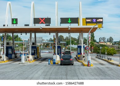Roads with toll booths on peage highways - Shutterstock ID 1586427688