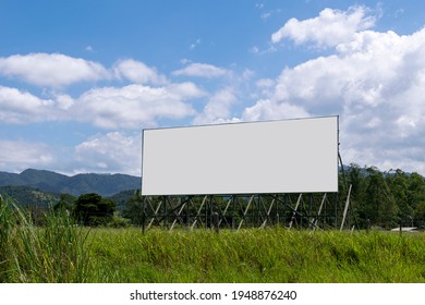 Roadside Advertising Panel With Views Of The Mountains. Billboard. Mockup Panel