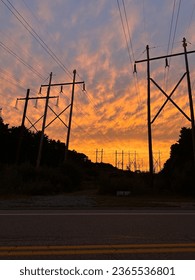 Roadside Aesthetic Vibrant Colorful horizon Sunset Phone background. Abstract, moody clouds. Orange and yellow and pink hues. Powerlines, shadows, contrast,  treeline landscape - Shutterstock ID 2365536801