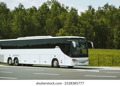 Roadside bus stop with white coach