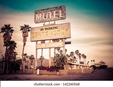 Roadside motel sign - decayed iconic desert Southwest USA - Powered by Shutterstock