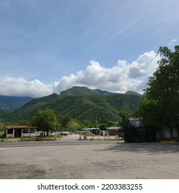 Roadside View Of A Mountain 