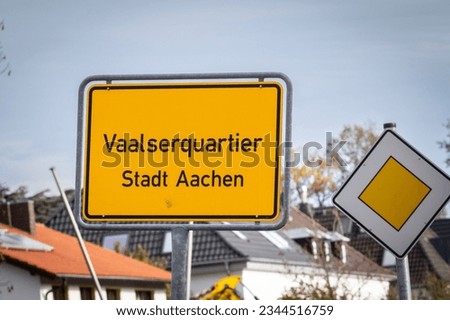 Roadsign and street sign indicating the entrance to the district of Vaalserquartier in the city of aachen with the mention in german stadt Aachen, meaning city of Aachen).