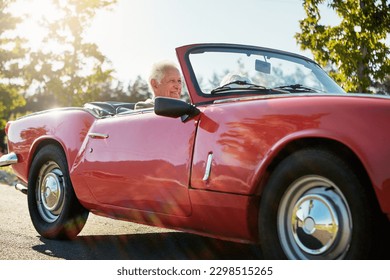 Roadtrips create a endless state of heightened excitement. a senior couple going on a road trip.