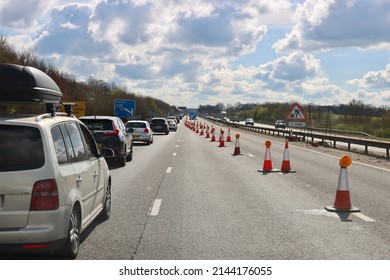 Roadworks and slow traffic going to tunnel crossing near Folkestone, England, UK - April 3, 2022