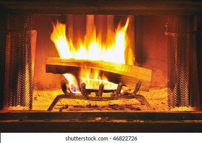 Roaring Fire In A Log Cabin