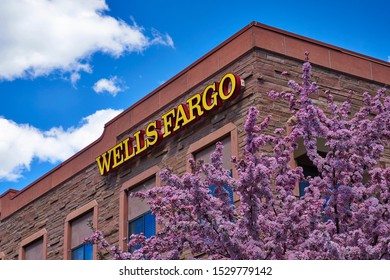 Roaring Fork Valley, Colorado / U.S.A. 2018 . Wells Fargo Bank Sign High On A Western Building In The Spring. Wells Fargo