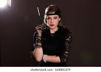 Roaring twenties poster flapper party girl, vintage 20s fashion style and make up and hairstyle, costume, model young woman, Caucasian girl