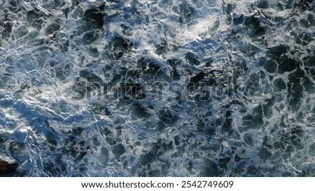 Similar – Image, Stock Photo the surf foams, roars and swells as seen from above