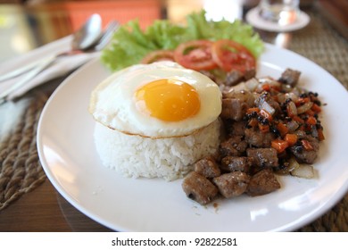 Roast Beef With Black Pepper And Fried Egg On Rice