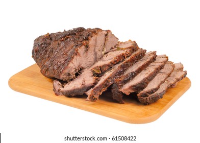 Roast Beef On A Wooden Board. Isolated On White.