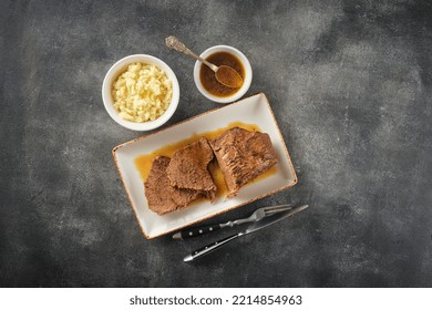 Roast Beef, Beef Stew, Cut Boiled Piece Of Beef With Sauce On A Plate, Top View, Flat Lay