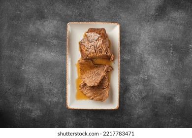 Roast Beef, Beef Stew, Cut Boiled Piece Of Beef With Sauce On A Plate, Top View, Flat Lay