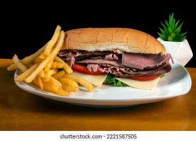 Roast Beef Sub With Tomato Lettuce And  Cheese Served With Fries