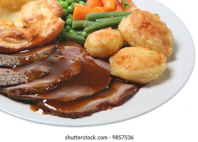 Roast Beef With Yorkshire Pudding, Vegetables And Gravy