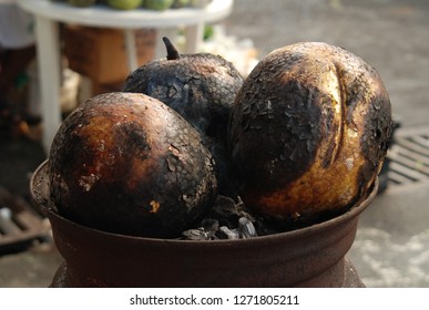 Roast breadfruit a traditional Jamaican dish served with ackee and saltfish