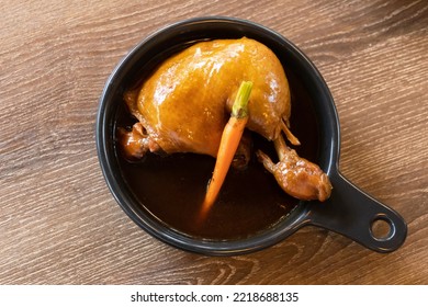 Roast Chicken With Gravy. Top View On Wooden Table Background.