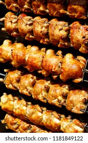 Roast Chicken. Industrial Grill With Chickens On Rolling Spit. Tasty And Crispy