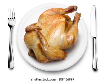 Roast Chicken On A Plate. View From Above On A White Background.