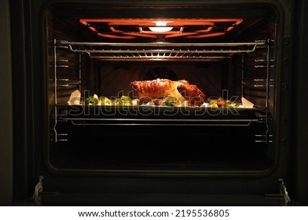 Roast chicken in the oven, cooking