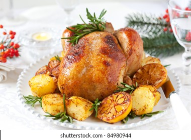 Roast Chicken With Potatoes,lemons And Rosemary For Christmas