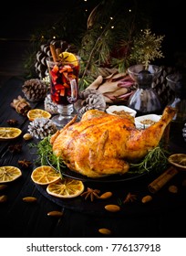 Roast Chicken Or Turkey For Christmas And New Year Thanksgiving Day With Mulled Wine And Christmas Decorations, Selective Focus