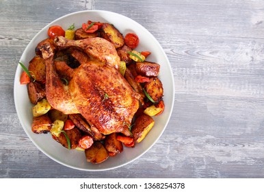 Roast Chicken With Vegetables On Plate, Top View