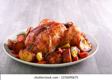 Roast Chicken With Vegetables On Plate