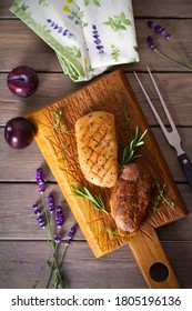 Roast Duck Breast Fillet On Serving Board. Overhead Vertical Image