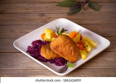 Roast Duck Breast Fillets With Potatoes, Carrots, Red Cabbage And Herbs. Overhead Horizontal Photo
