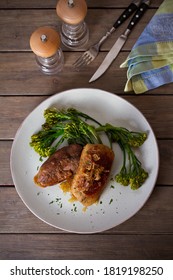 Roast Duck Breast Fillets With Vegetables On Plate. Overhead Vertical Image