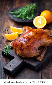 Roast duck in orange glaze, selective focus - Shutterstock ID 285770201