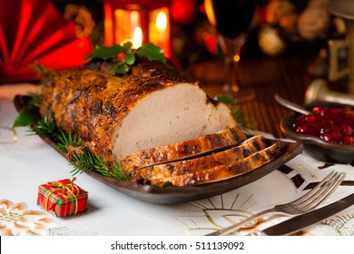 Roast Pork Loin With Christmas Decoration. Front View. 