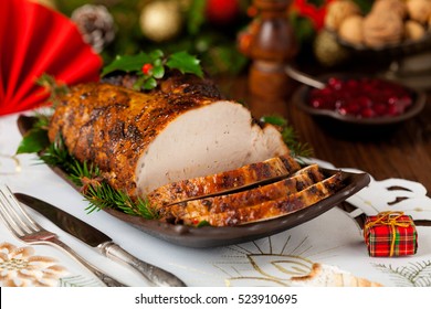 Roast Pork Loin With Christmas Decoration. Front View. 