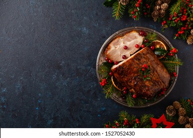 Roast Pork Neck In Christmas Style. Dark Navy Blue Background. Christmas Accessories. Top View.