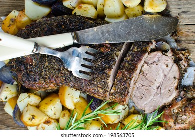 Roast Pork Shoulder With Potatoes And Herbs