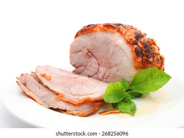 Roast Pork And Slices Isolated On White