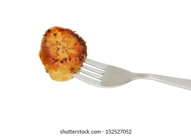 Roast potato on a fork isolated against white - Powered by Shutterstock