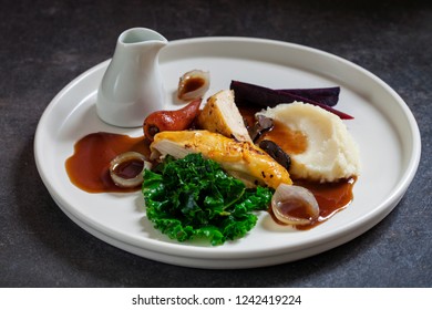 Roast Poussin With Celeriac Mash, Carrot, Kale, Truffle And Gravy