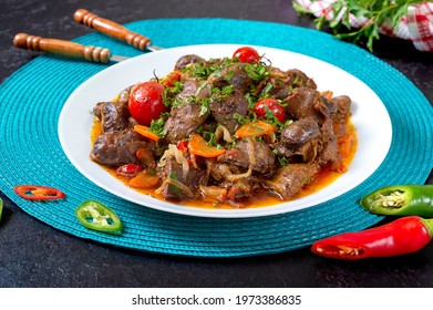 Roast turkey liver with vegetables and herbs. Diet dish