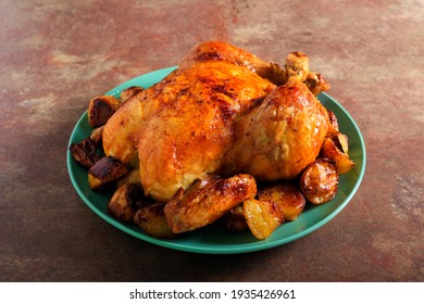 Roast whole chicken with potatoes