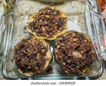 Roasted Acorn Squash With Wild Rice Stuffing.