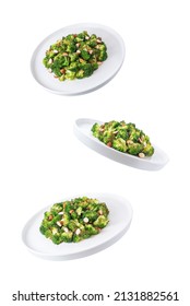 Roasted Broccoli With Almond Slices On A White Isolated Background. Toning. Selective Focus