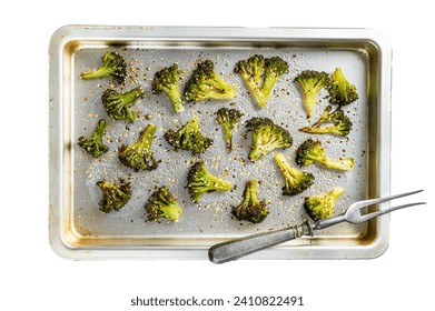 Roasted broccoli cabbage with garlic in baking tray. Isolated on white background, top view