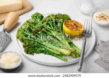 roasted broccolini with cheese and garlic, selective focus