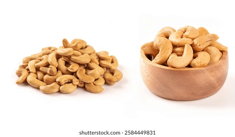 Nueces de anacardo tostadas en un tazón de madera aislado sobre fondo blanco.