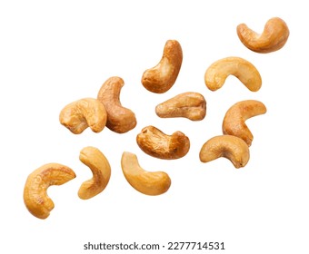 Roasted cashews flying close-up on a white background. Isolated